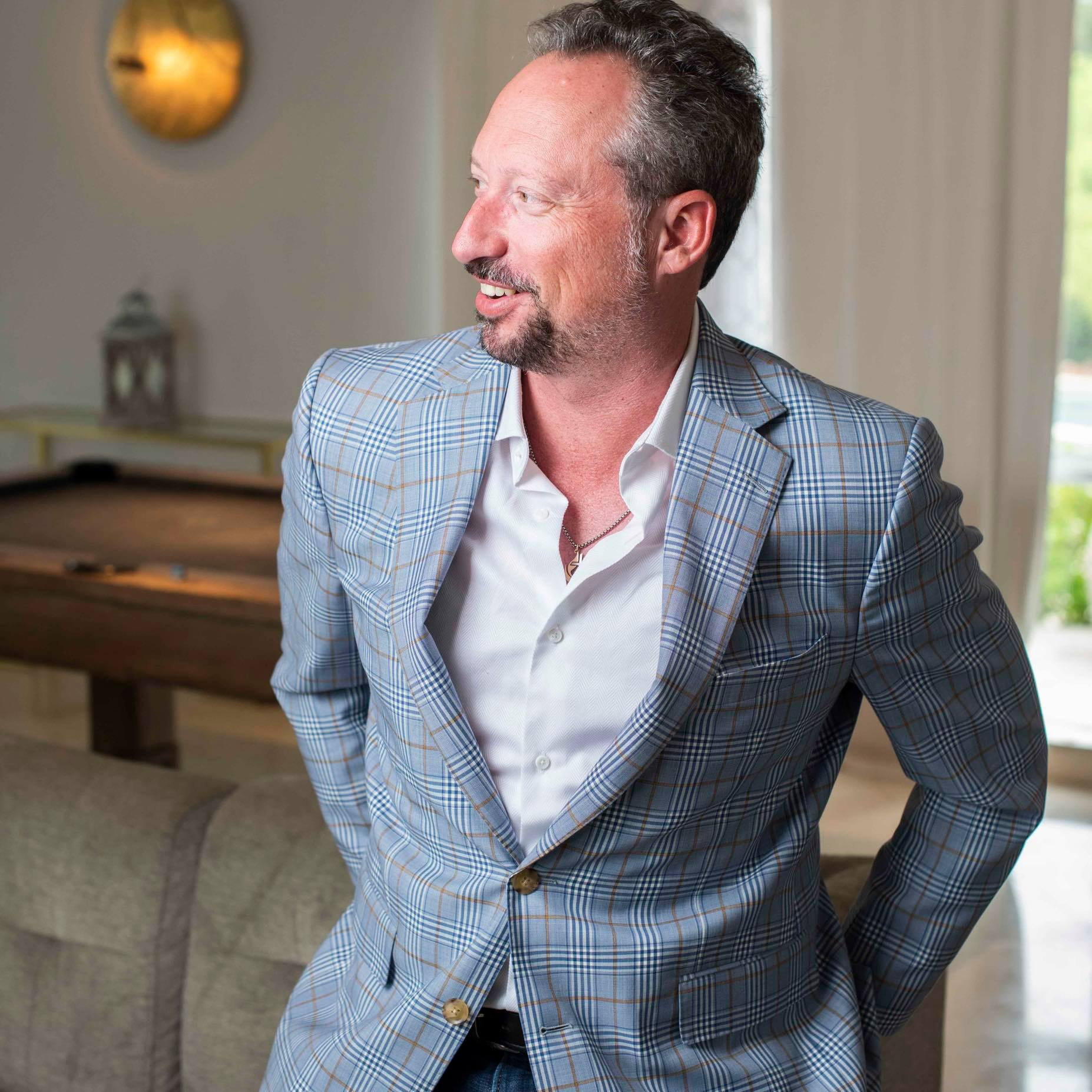 Jason Bible seated in a gray jacket